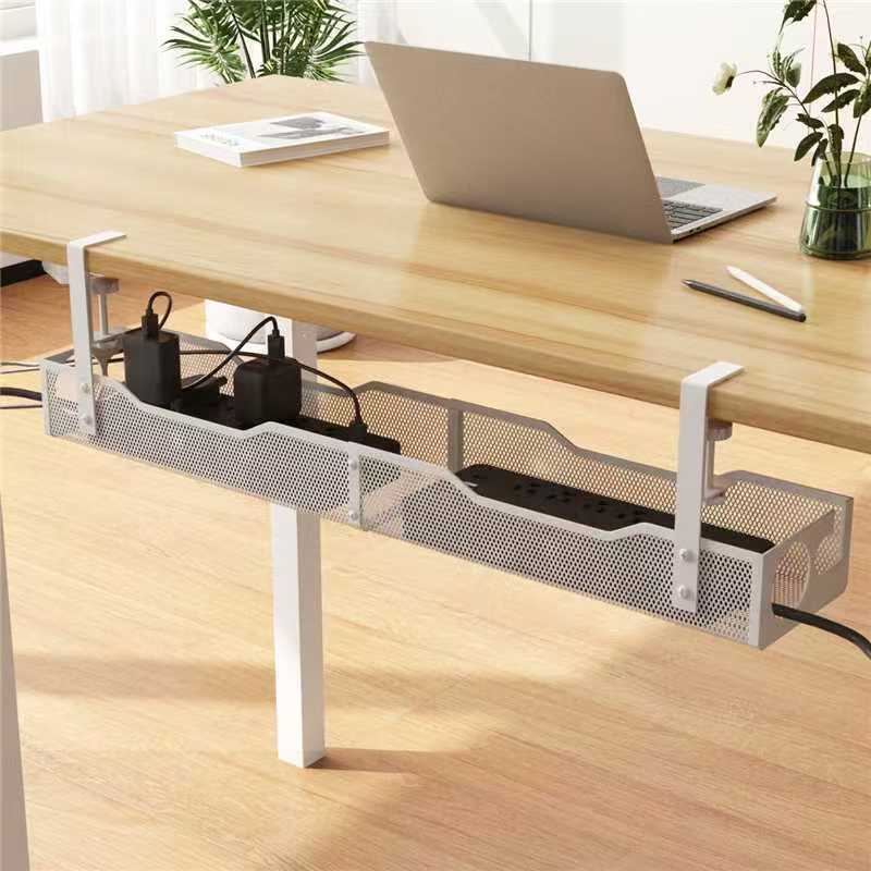 TidyDesk under-desk cable management tray in black, mounted beneath a wood desk holding a power strip